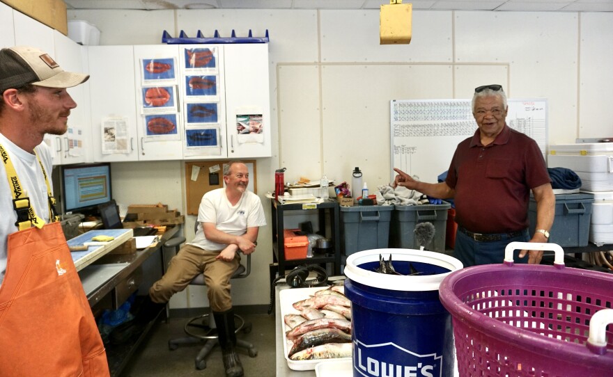 At the College of William & Mary Virginia Institute of Marine Science Fisheries Science Lab from left: Timothy Hoyt, Patrick McGrath and Mac Custalow enjoy a lively discussion on what has led to the collapse of the American shad in Virginia.