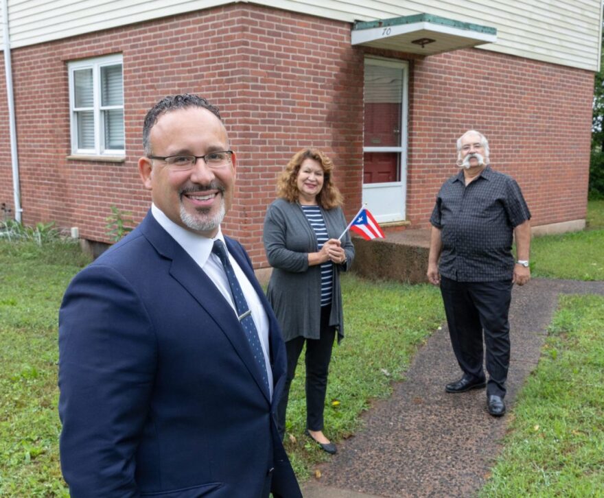 Miguel Cardona with his parents in Meriden.