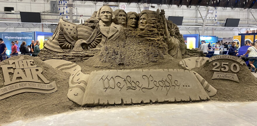 A large sand sculpture commemorating the 250th anniversary of the Declaration of Independence inside the Center of Progress building at the New York State Fair.