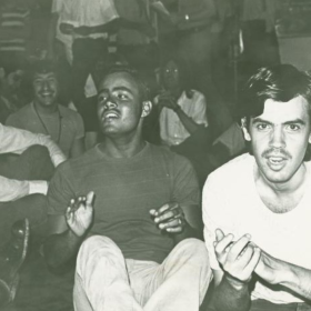 Gay activists gather at a New York City YMCA in August 1971 to protest discriminatory policies against gay men.