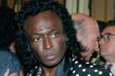 FILE - In this July 16, 1991 file photo, jazz great Miles Davis is pictured after receiving the Chevalier de la Legion d'Honneur award medal from the French government in Paris. Davis wasn't even listed in the program book when he appeared for the first time at the Newport Jazz Festival in 1955, but he made his presence felt with a career-reviving performance in an all-star jam session. This year's program book is Miles-centric as the festival, which begins July 31, celebrates the 60th anniversary of the late jazz legend's historic Newport debut. (AP Photo/Remy de la Mauviniere, File)