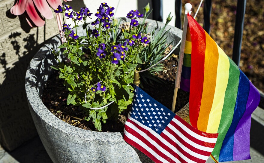 A new state law limiting which flags are legal on government property means Pride flags aren’t flying along the median on Harrison Boulevard in Boise this year. But residents are finding new ways to show their support.