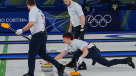 FILE - United States' Aidan Oldenburg, Ben Richardson, and Luc Violette in action during the men's curling round robin session against Norway, at the 2026 Winter Olympics, in Cortina d'Ampezzo, Italy, Sunday, Feb. 15, 2026.