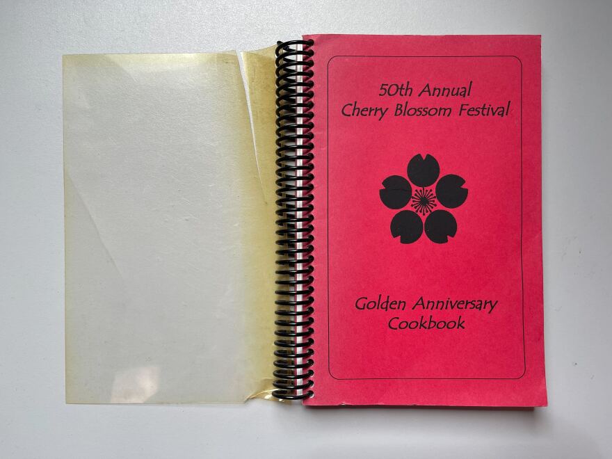 The cover of a recipe book from Honolulu Japanese Junior Chamber of Commerce celebrating its 50th Annual Cherry Blossom Festival.