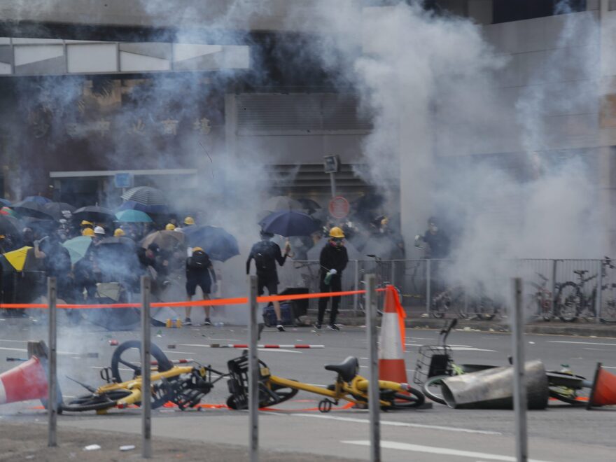 Police fire tear gas at anti-government protesters at Sha Tin, Hong Kong, on Tuesday.