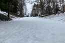 Snow-covered neighborhood road in Winston-Salem.