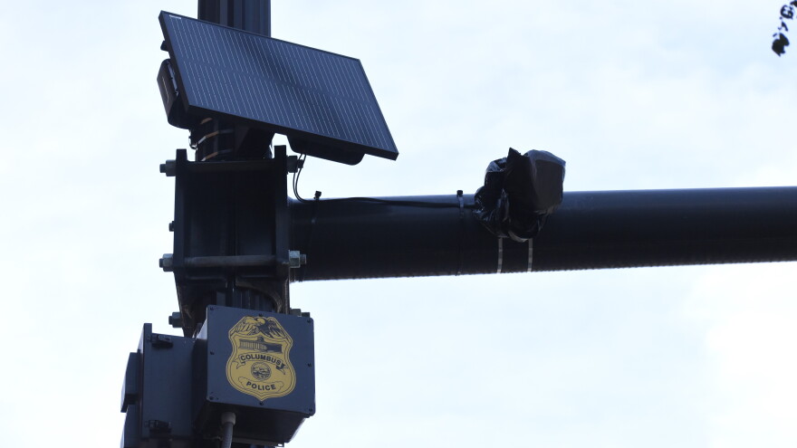 A Flock Safety automatic license plate camera at the corner of 5th Avenue and North High Street was covered with a plastic bag on September 4, 2026 by the Columbus Division of Police after Mayor Andrew Ginther suspended the use of the surveillance technology.