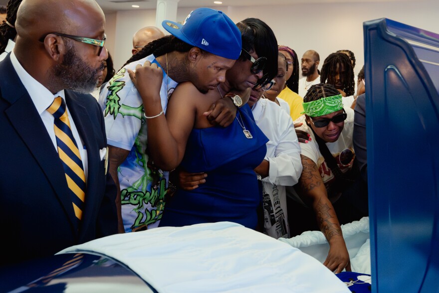 Anita Washington weeps as she mourns the death of her son, Samuel Hayes Jr., during a funeral service at Layne Renaissance Chapel on Thursday, Aug. 21, 2025, in Jennings, Mo. Washington has since filed a wrongful‑death lawsuit against the city, several corrections officers, nurses and the jail’s medical‑care provider, alleging neglect and failure to monitor Hayes after he was restrained at St. Louis City Justice Center. Criminal justice reform advocates have said St. Louis’ jail is one of the deadliest in the Midwest, recently having their deathcount since 2020 rising to 21. (Brian Munoz / St. Louis Public Radio)