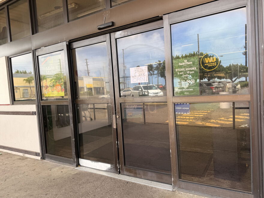A sign reads "Yes we are open!" at a Sack N Save in Nānākuli. (Sept. 8, 2026)