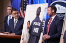 Daniel Rosen, U.S. Attorney for the District of Minnesota, speaks during a news conference at the Department of Justice, Wednesday Sept. 30, 2026, in Washington, as Attorney General Todd Blanche, left, and Secretary of Homeland Security Markwayne Mullin, look on.
