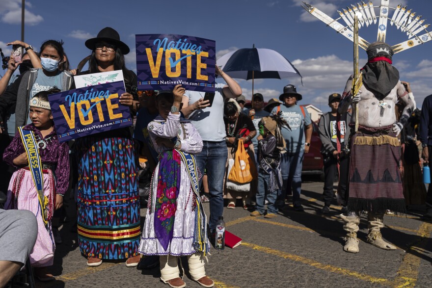 Navajos gather for a "Get out the vote" or GOTV march in a push for Native Americans to vote in the upcoming presidential election, on the Navajo Nation in Fort Defiance, Ariz., Saturday, Oct. 12, 2024. Logistical and legal obstacles have long stood in the way of Arizona's 420,000 Native citizens casting their vote.