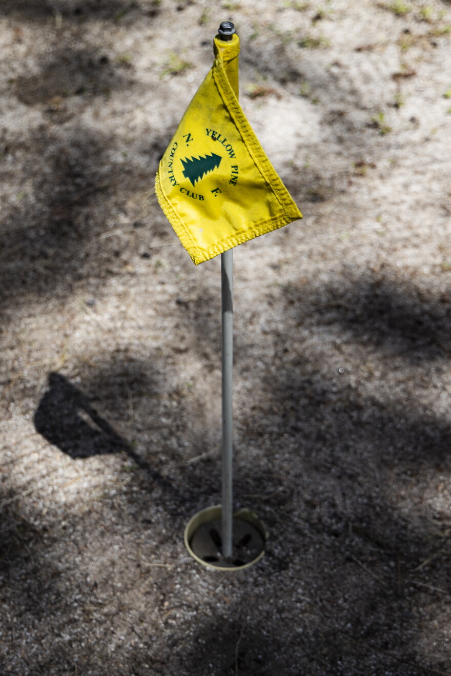 The greens at the Yellow Pine Country Club are made with fine river sand.