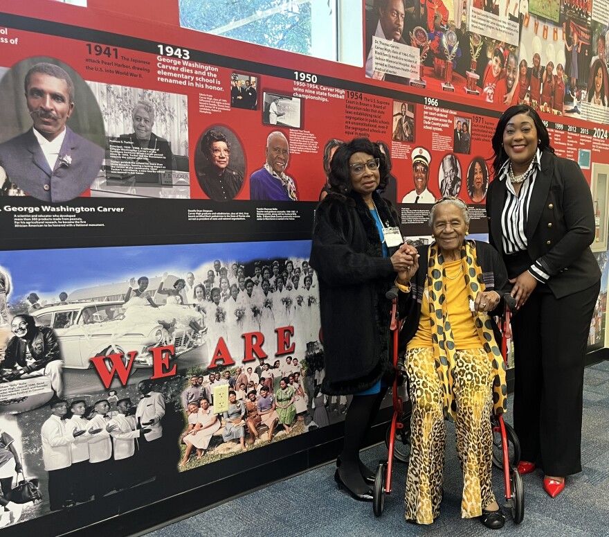 Maud Newbold (left), Thelma Gibson (center) and Patricia Fairclough (right) after the history wall's unveiling.