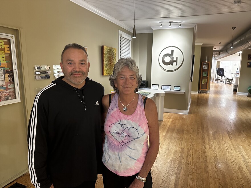 Genaro Castro (left) and Cindy Martinez visit the Delaware House for Latin dance lessons.