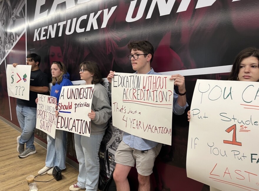 EKU students protested against a cut to academic affairs that would impact salaries for faculty teaching summer classes and program coordinators that oversee course accreditations during Wednesday's Board of Regents meeting.