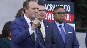 California state Assembly Republican leader James Gallagher of Yuba City, left, speaks against a package of measures to redraw the state's Congressional districts and put new maps before voters in a special election, during a news conference in Sacramento, Calif., Thursday, Aug. 21, 2025.