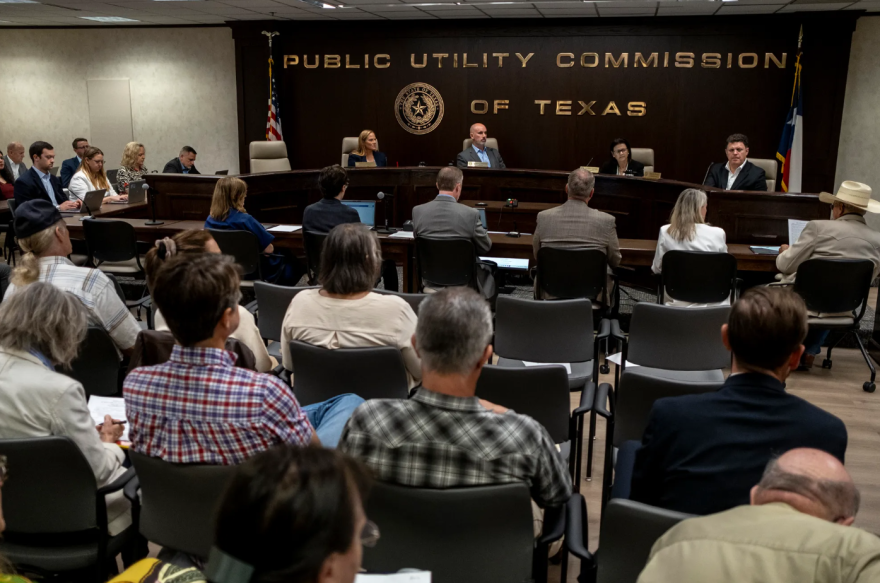 Commissioners of the Public Utility Commission of Texas listen to public comment during a special open meeting in Austin on Friday, August 14, 2026. 