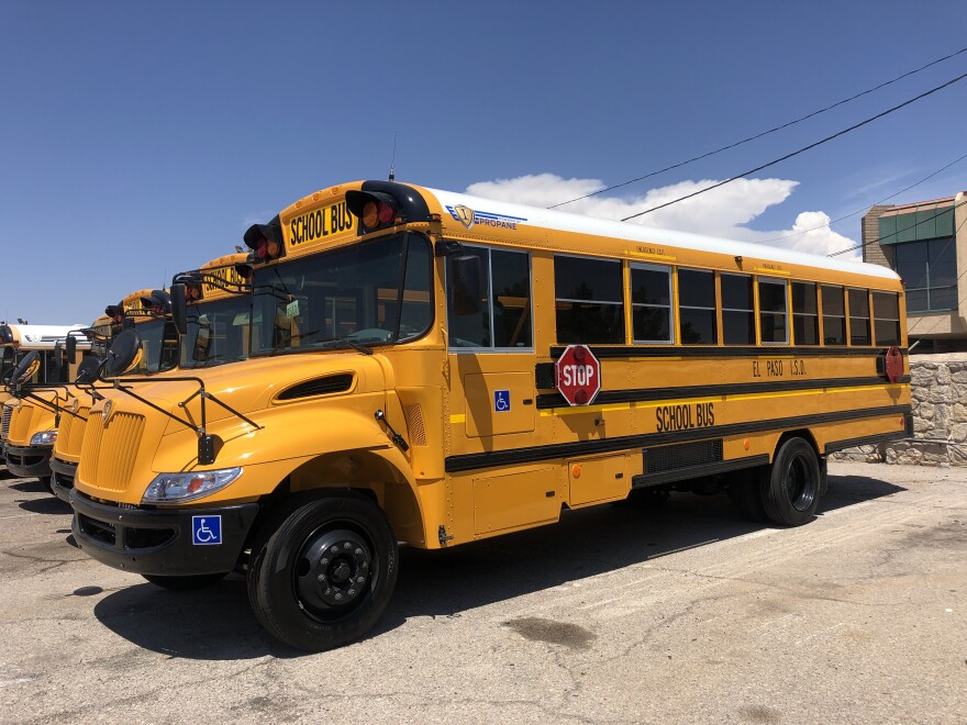 El Paso ISD school busses sit parked three days before classes begin.