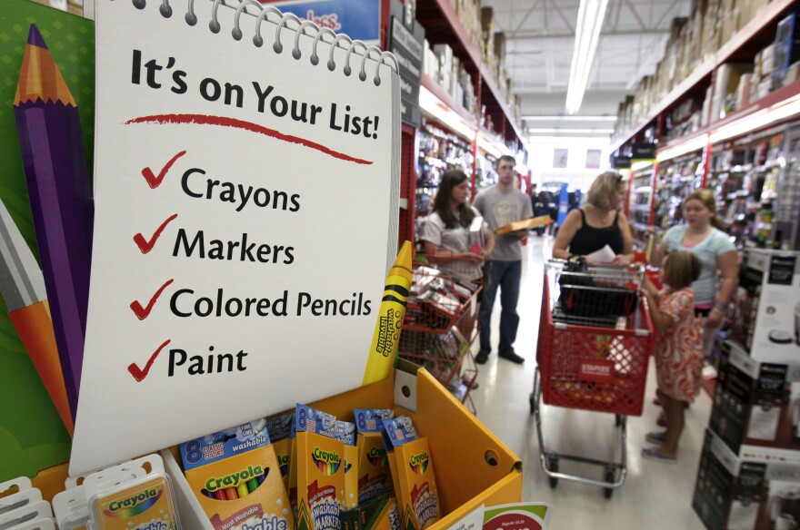 In this photograph taken Aug. 1, 2010, back-to-school shoppers crowd the aisles at a Staples store in Little Rock, Ark. The pace of consumer spending stalled in June and personal incomes failed to increase, further evidence that the economy slowed significantly in the spring. (AP Photo/Danny Johnston)