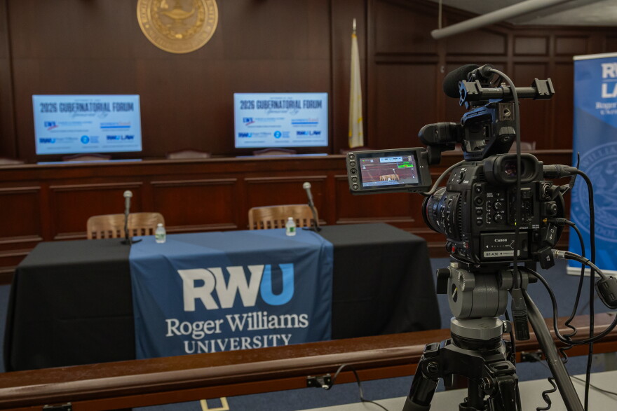 Preparation for the gubernatoria forum is underway at the Roger Williams University School of Law. Credit: Rose Wheeler/Ocean State Media