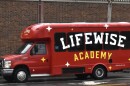 A LifeWise Academy bus drives through New Albany on February 18, 2026.