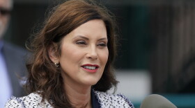Michigan Gov. Gretchen Whitmer addresses the media after signing the final piece of a $76 billion state budget into law, July 20, 2022. (AP Photo/Carlos Osorio)