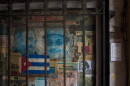 Photos of former Raúl Castro Fidel Castro cover a front door