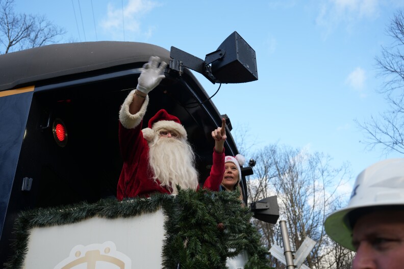 Santa Claus waves to spectators during the annual CSX Santa Train on Nov. 22, 2025.