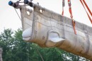 A rescued beluga whale is lifted in a specialized transport sling during an international effort to relocate whales from Marineland of Canada to accredited aquariums in the United States and Europe.