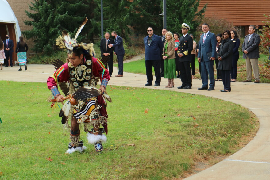 First Lady Jill Biden and surgeon general Dr. Vivek Murphy arrive at the Saginaw Chippewa tribe’s Ziibiwing cultural center outside Mount Pleasant Sunday and are greeted with traditional music and dancing.