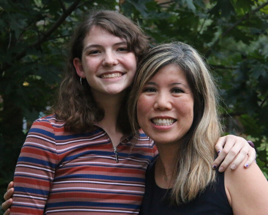 Lily Kraxberger, left, wears a bright striped T-shirt. Dr. Jennifer Su, right, has on a sleeveless black top. 