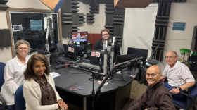 From left to right: Rev. Robin McCullough-Bade, an ordained Evangelical Lutheran minister and former director of the federation; Ma’at Latham, current executive director of the federation and member of the Church of God in Christ; WRKF's Alex Cox; Nguyen An, also known as “Brother Fred,” a monk at the Tam Bao Meditation Center; and Joel Goldman, a retired veterinarian and Hebrew teacher.