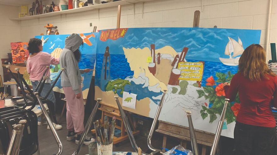 Cypress Lake High School students work on BIG ARTS mural.