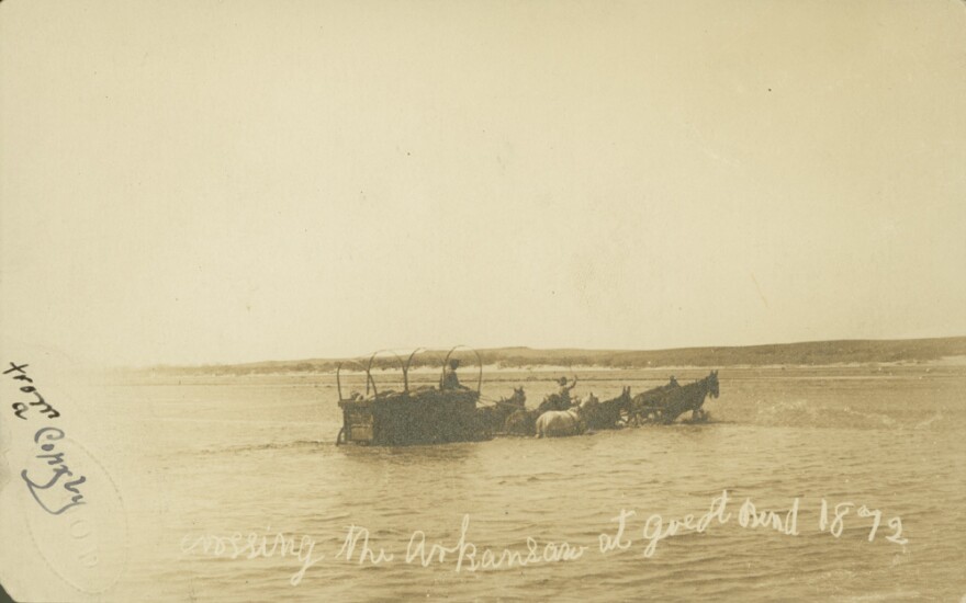 Covered wagon crossing the Arkansas River at Great Bend, KS in 1872