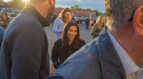 Democratic state representative and comptroller candidate Margaret Croke talks to a staffer on Gov. JB Pritzker’s campaign on Monday, Oct. 27, before filing nominating petitions for comptroller.