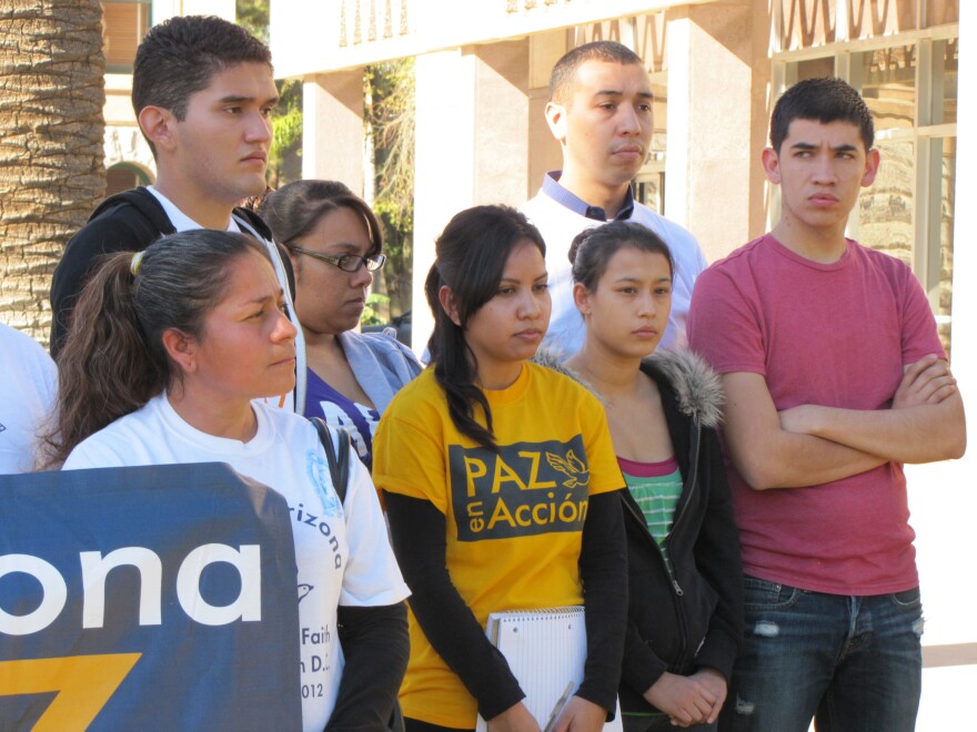 Elisa Vega (in yellow) was granted a work permit but is ineligible for an Arizona driver's license.