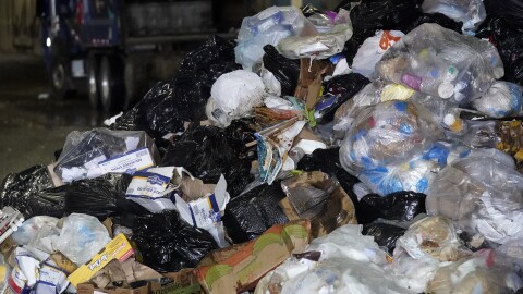 Organic materials from commercial food waste is piled up