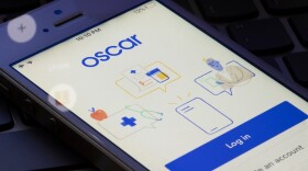 The Oscar Health mobile app login page is seen on an iPhone. Oscar Health Insurance is an American technology-driven health insurance company.