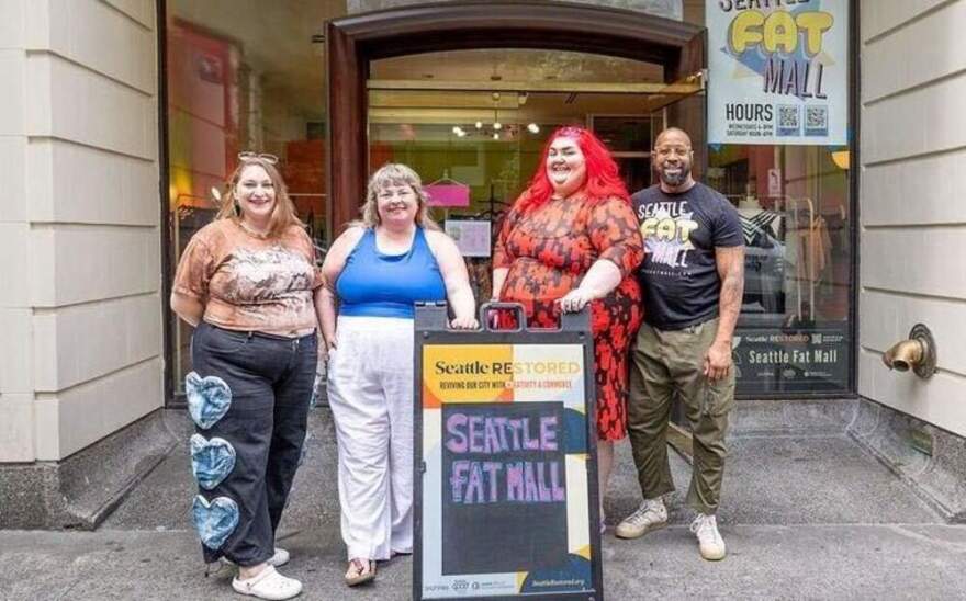 (Left to right) Alyss Seelig, Amber Seelig, Candace Frank and Kwame Phillips-Solomon stand in front of the Seattle Fat Mall. (Courtesy of Alyss Selig)