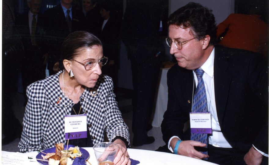 WXXI President Norm Silverstein, right, who served on the Board of Directors of National Women’s Hall of Fame, speaks with Supreme Court Justice Ruth Bader Ginsburg, who was being inducted into the Hall of Fame in 2002.
