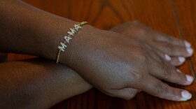 Patricia wears a bracelet that her children gave to her for mother’s day this year. Her oldest son has been deported to their home country in Central America, and her second son must also leave by September.