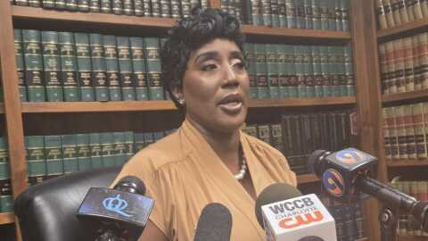 Woman at microphones