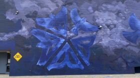 One of the four new murals in Rochester, celebrated on Saturday, 4/20/24. This one was created by artists Shawnee Hill & Katie Jo Suddaby, and it's located at the Edgerton R-Center, 41 Backus St.