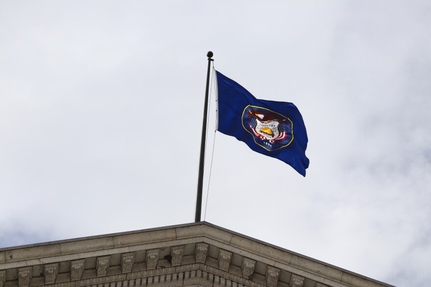 Photo of flag on Utah Capitol.