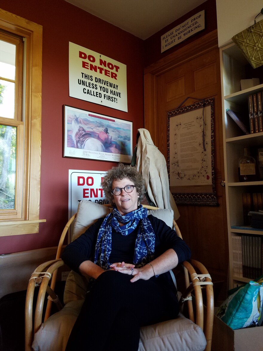 Joyce Harrington Bahle was Jim Harrison's assistant for over 35 years. Here she's pictured sitting in one of Jim's old chairs.