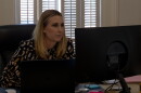 Lacey Thompson, a criminal defense attorney with an office in Columbia, works at her desk.