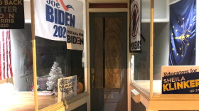 The door to the Tippecanoe County Democrats' HQ boarded up after shots were fired into the building Jan 7, 2020.