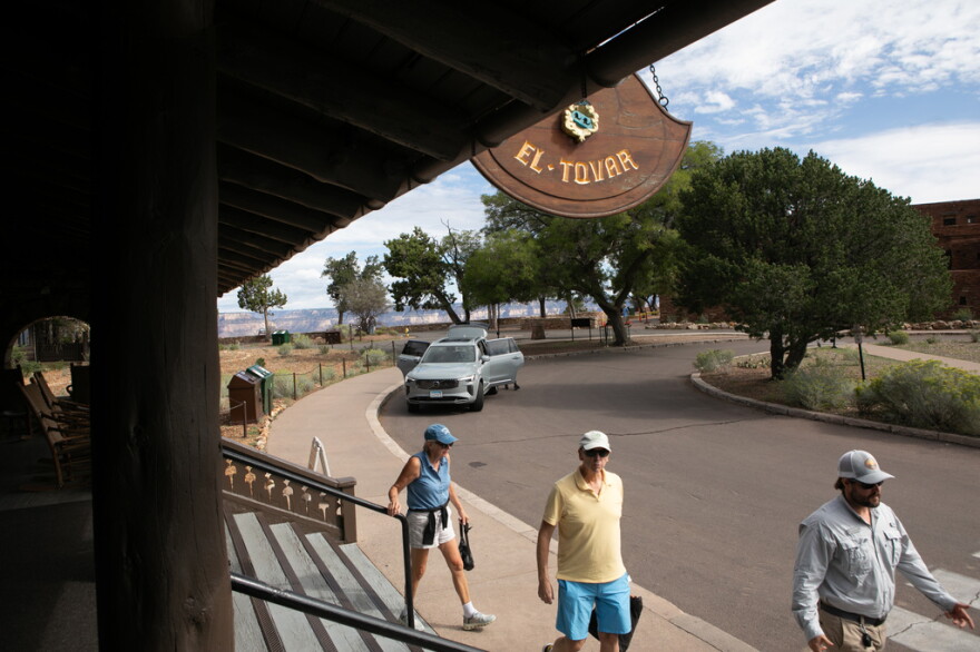 Tourists check out of the El Tovar Hotel as lodging along the rim of the canyon was shut down due to flooding, Monday, Aug. 31, 2026 at Grand Canyon National Park, Ariz.