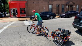 James Bragado tests out a mobile sound monument that was designed to elevate the types of music heard in predominantely Latino neighborhoods.