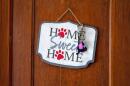A Home Sweet Home sign on Brie Lamarche’s kitchen.